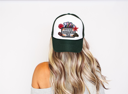 Put It On My Husbands Tab Trucker Hat